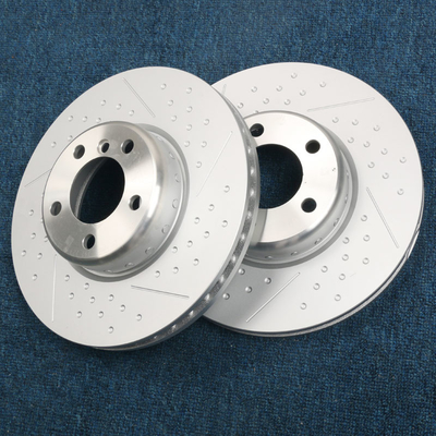 Rotor và miếng đệm bằng thép carbon cao được khoan và xẻ rãnh phù hợp với bộ dụng cụ kẹp phanh BMW 4 nồi